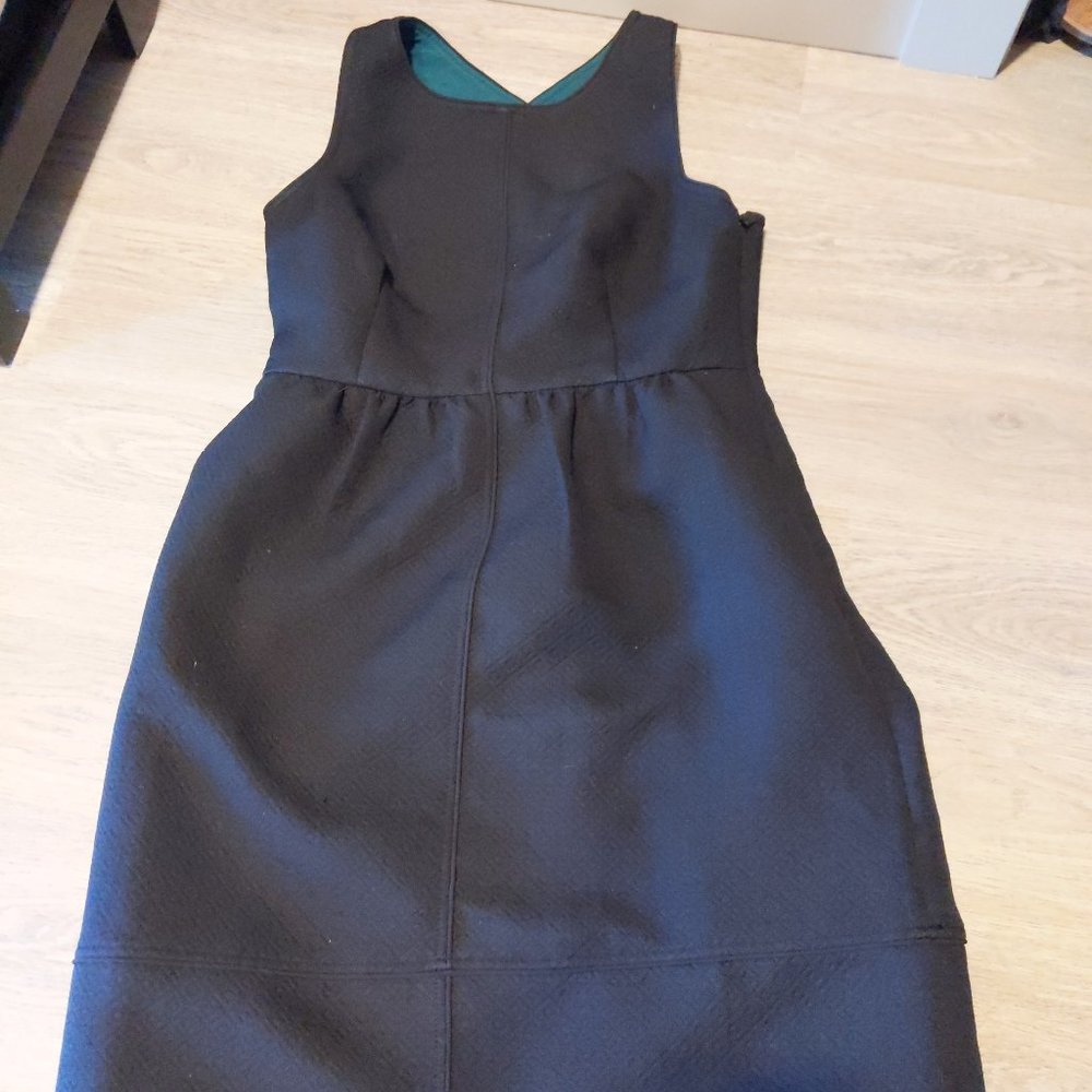 Anthropologie black size 12 crisscross back patterned dress with POCKETS!